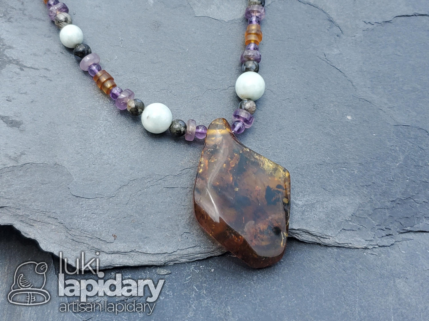 RARE >> Baltic Amber / Jadeite Jade >> Amethyst >> Que Sara >> Full Bead Pendant
